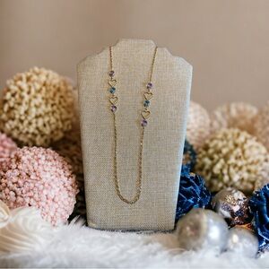 Vintage Avon pink and blue hearts necklace.